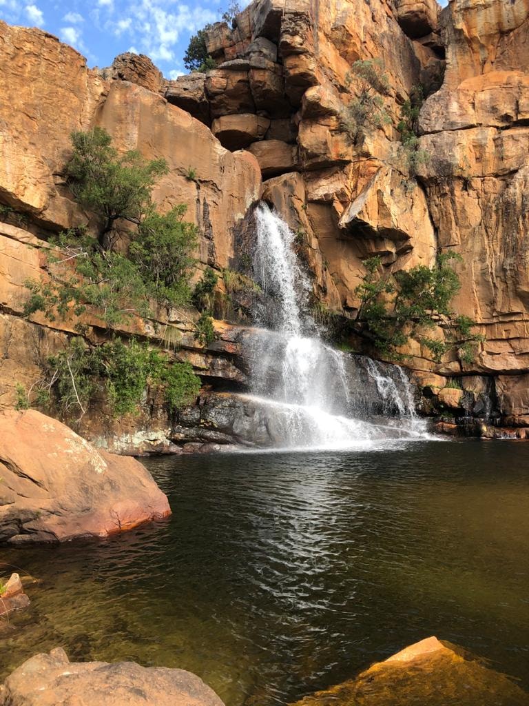 The waterfall at Waterfall Farm — natural pool and rock formations